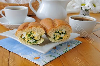 Baguette stuffed with spinach, onion and egg