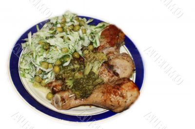 Fried chiken and cabbage broccoli on the plate