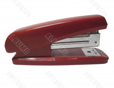 Red stapler isolated on the white background