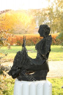 Sculpture - a silhouette of a seated person
