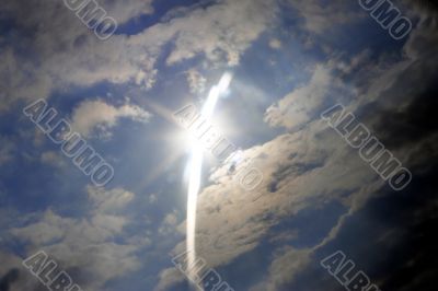 Dramatic sky and rays falling through the clouds