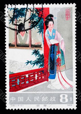 A stamp printed in China shows an ancient love story