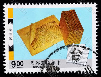 A stamp printed in Taiwan shows ancient books
