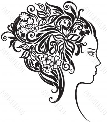 Girl with a beautiful flowers in her hair