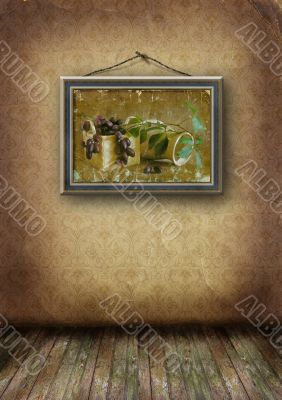 picture in a frame hangs on an old wall picture in a frame hangs on an old wall