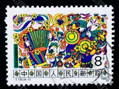 A stamp printed in China shows happiness in the countryside