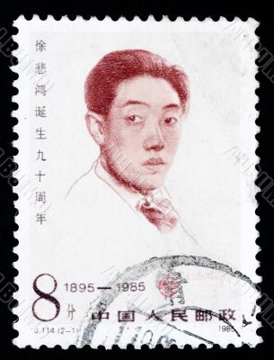 A stamp printed in China shows the portrait of the famous artist Xu Beihong
