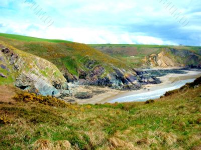 Grassy Hills And Beach Wales