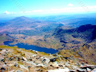 Lake In Valley Of Mountains