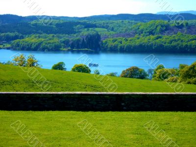 Boat On Lake Behind Wall