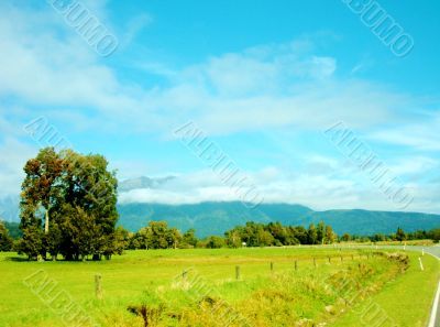 Cloudy Mountains And Field 