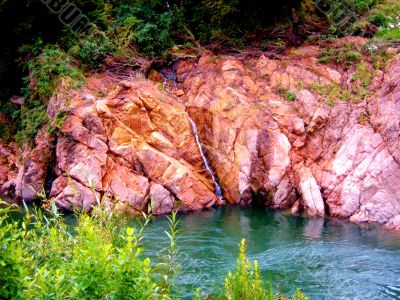 Small Waterfall Down Rock Face