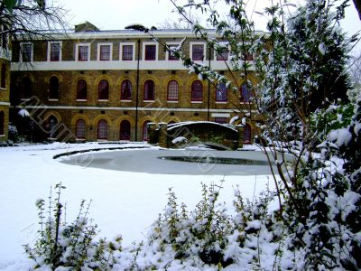 Georgian House Over Snowy Garden