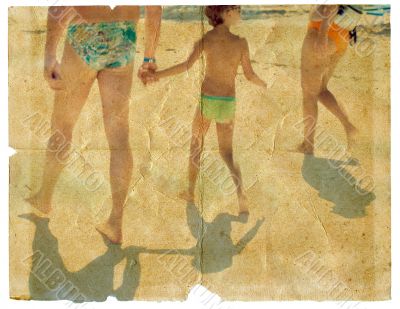 Family walking on the beach. Family walking on the beach.