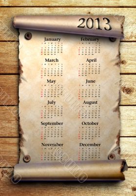 Calendar 2013 Scroll of old paper on wooden boards    
