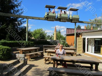 Woman relaxing in a cafe in the park &quot;Turopark&quot;