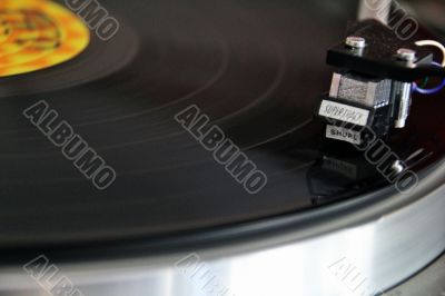 Vinyl Record lies on the turntable