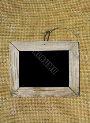 Old wooden picture frame on the wall texture. 
