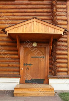 Entrance into a wooden house 