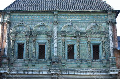Tower of green color  with windows