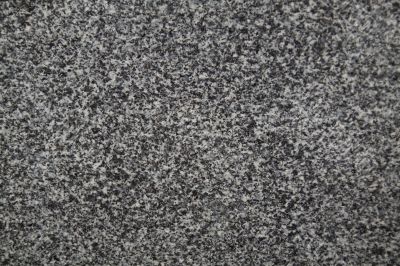 Closeup of dark grey granite texture