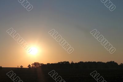 Sunrise over the summer meadow. North caucasus landscapes