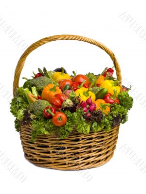 huge vegetable basket isolated on white