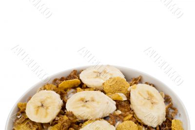 cropped bowl of cereals with banana
