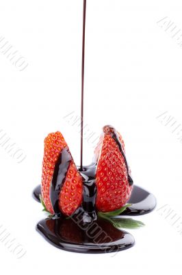 pouring syrup and strawberry