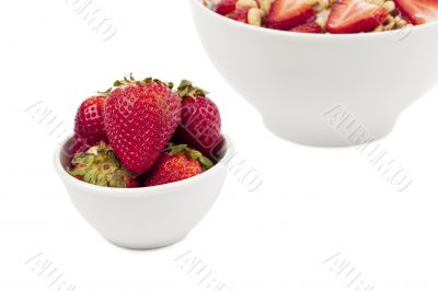 cropped bowl of cereals and strawberry