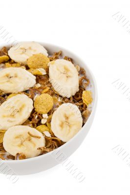 cropped image of cereal and banana in bowl 