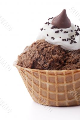 cropped image of chocolate ice cream in a sugar cone