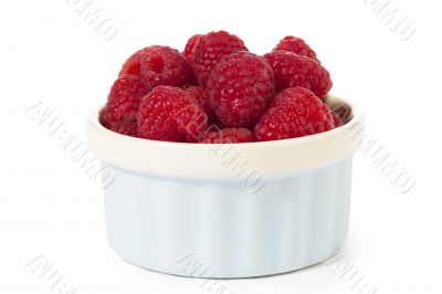 raspberries in a container