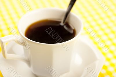 cup of coffee with spoon