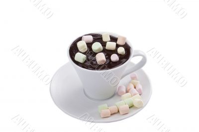 marshmallows dipped into melted chocolate cup