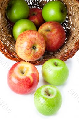 apples spilling out of basket