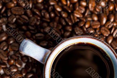 coffee cup with coffee beans