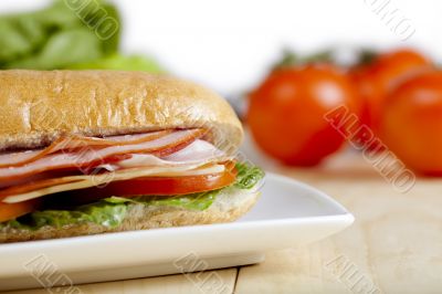 close up image of ham sandwich