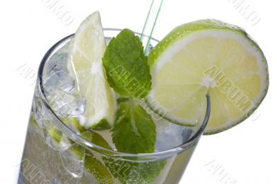 close up image of lemon slice peppermint in glass