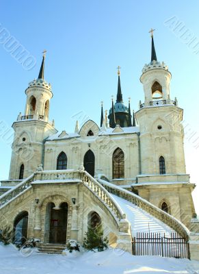 White stone church built in russian gothic style (pseudo gothic)