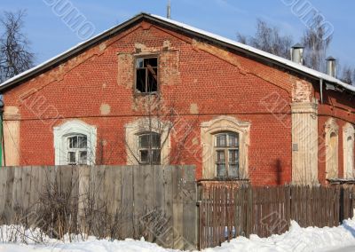 house behind the fence
