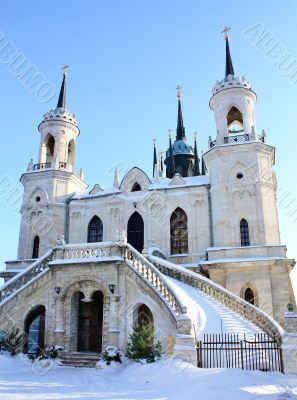 White stone church built in russian gothic style (pseudo gothic)