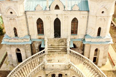White stone church built in russian gothic style, view from abov