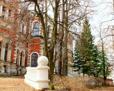 Abandoned old estate among the leafless trees