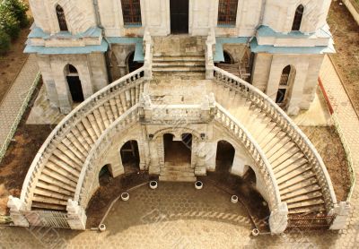 White stone church built in russian gothic style, view from abov