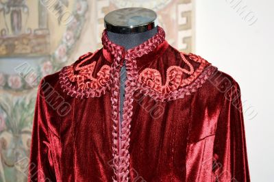 Embroidered red velvet jacket with braid