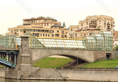 View of the bridge and embankment across the river