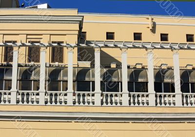 Yellow wall with balcony of an historic building