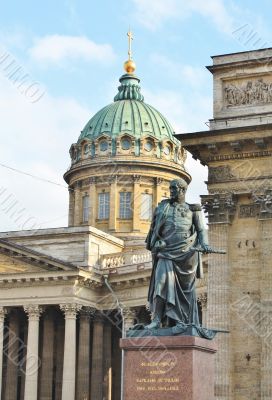 Monument on the background of the Kazan Cathedral