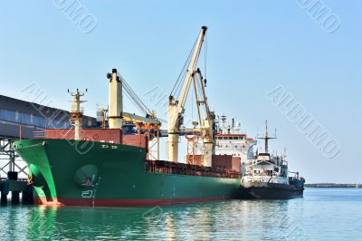 Cargo vessel at the seaport terminal